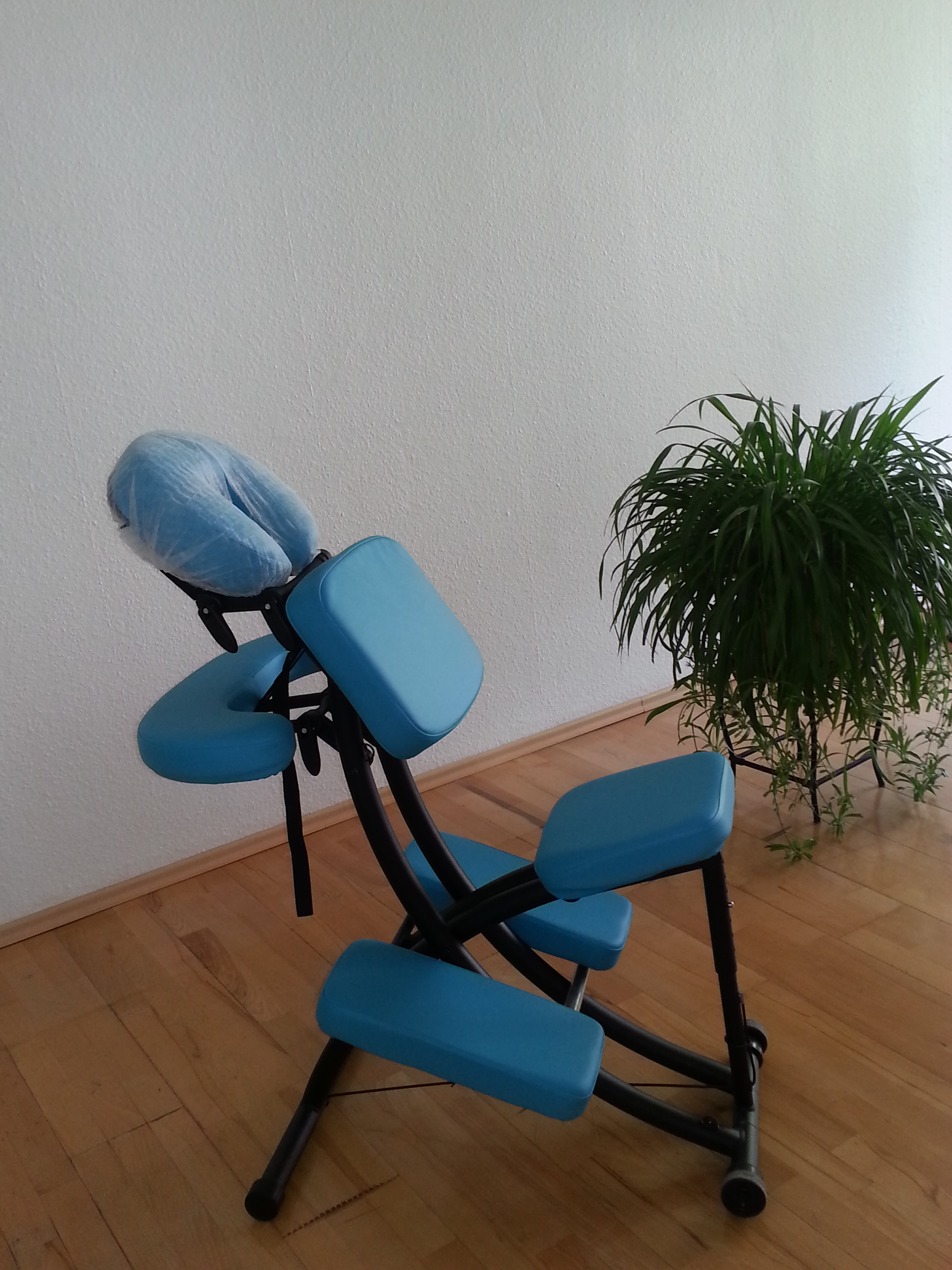 Shiatsu-Behandlung auf dem Stuhl